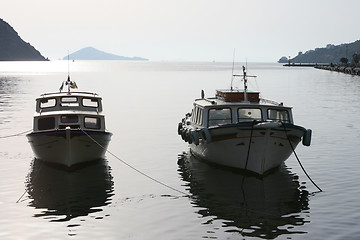 Image showing two dark boats