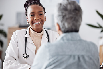 Image showing Happy, black woman or doctor consulting a patient in meeting in hospital for healthcare feedback or support. Smile, medical or nurse with a mature person talking or speaking of test results or advice