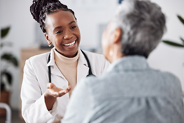 Image showing Smile, black woman or doctor consulting a patient in meeting in hospital for healthcare feedback or support. Happy, medical or nurse with a mature person talking or speaking of test results or advice