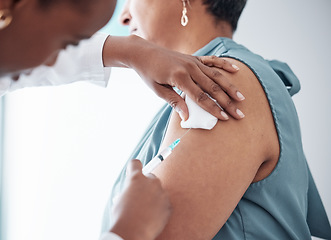 Image showing Medicine, healthcare and doctor with woman for vaccination in a clinic for medical treatment for prevention. Closeup of a nurse doing a vaccine injection with a needle syringe in a medicare hospital.