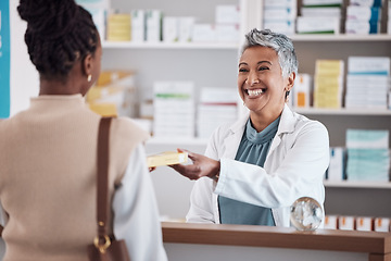 Image showing Pharmacist, medicine or happy woman giving package to patient in customer services help desk. Pharmacy, smile or mature doctor with medical product, pills or supplements in retail healthcare clinic