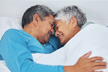 Image showing Bed, care and old couple with love, relax and marriage with retirement, relationship and romance. Morning, happy elderly man or senior woman with trust, bedroom and bonding with peace, home and smile