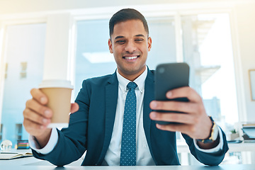 Image showing Phone, coffee and business man in office online for social media, networking and check email. Corporate worker, professional and person with tea on smartphone for internet, website and mobile app