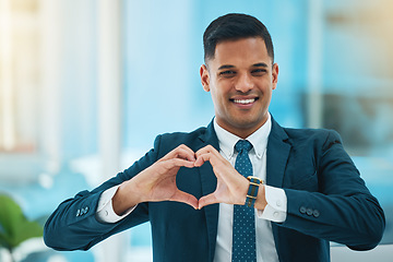 Image showing Hands, heart and portrait of business man for love, care and kindness of like emoji in office. Happy corporate worker with finger shape for thank you, trust and sign of hope, support or icon of peace