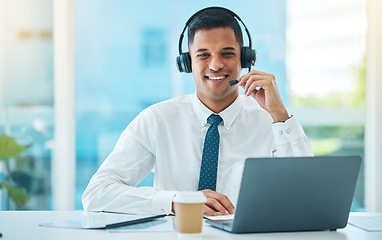 Image showing Call center, laptop and portrait of man in customer service, support or help desk office. Face, telemarketing and happy sales agent in communication, consultant and professional to contact us for crm