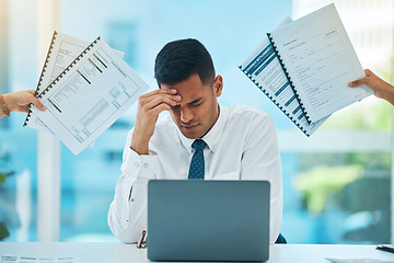 Image showing Stress, laptop and documents in hands with a businessman in his office overwhelmed by a deadline. Burnout, multitask or overworked and corporate employee with a headache in his professional workplace