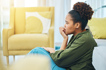 Image showing Home, anxiety and woman with fear, depression and scared with mental health, biting nails and mistake in a lounge. Person on the floor, lady or girl confused, fail and waiting for feedback or results