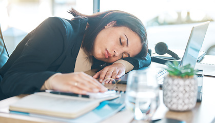 Image showing Tired, work and a woman at a desk for sleeping, corporate or working burnout in an office. Narcolepsy, table and a female business employee with a nap, rest or fatigue from company stress or job