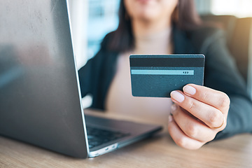 Image showing Business woman, hands and credit card on laptop for e commerce, online shopping and fintech payment in office. Professional worker on computer for website, banking security and investment or loan
