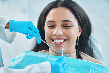 Image showing Dentist, hands and patient, woman and teeth whitening, metal tools for dental procedure and healthcare. Smile, tooth decay and veneers treatment, excavator and wellness with oral health at clinic