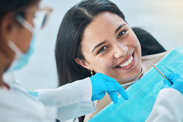 Image showing Woman, face and teeth whitening, dentist and dental with health, smile in portrait during procedure and treatment. Trust, help and metal tools with doctor, orthodontics and oral care for veneers