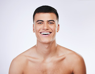 Image showing Man, beauty and face, skin and happy with grooming for hygiene and clean isolated on white background. Portrait, model and dermatology, skincare and treatment with cosmetics and wellness in a studio