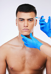 Image showing Man, syringe and plastic surgery for eye in studio portrait, doctor and wellness for beauty, change or white background. Young model, needle and hands for face, cosmetic transformation or dermatology