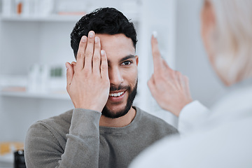 Image showing Hand on eye, test and vision, optometrist and patient with health and eyecare, glasses and eyesight exam. Assessment, wellness and man with woman at optometry clinic, help and trust with visual