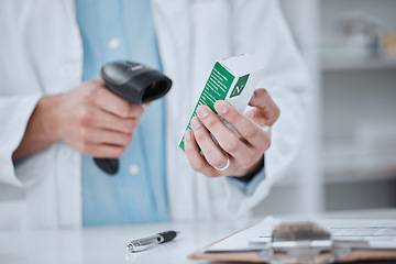 Image showing Person, pharmacist and hands scanning box in price check, inventory or inspection on medication at pharmacy. Closeup of medical or healthcare employee checking cost on pharmaceutical product or drug