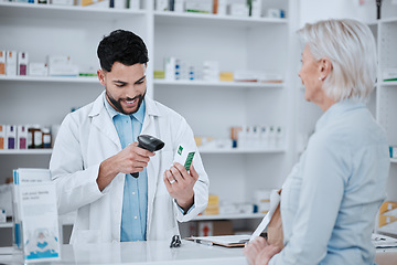 Image showing Happy man, pharmacist and scanning box for customer in consultation, medication or pills at pharmacy. Male person, medical or healthcare employee checking price on pharmaceutical product at drugstore