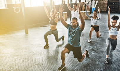 Image showing Lunge, group or people in gym with personal trainer for balance, fitness training or a healthy body. Women, men or coach instructor in exercise or workout for strong legs in wellness studio class