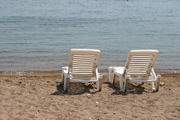 Image showing white sun beds