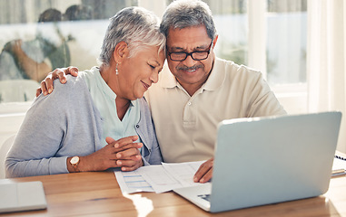 Image showing Senior couple, documents and computer for home, investment or budget, retirement or pension with love and hug. Elderly woman and man on laptop for asset management, loan agreement and life insurance