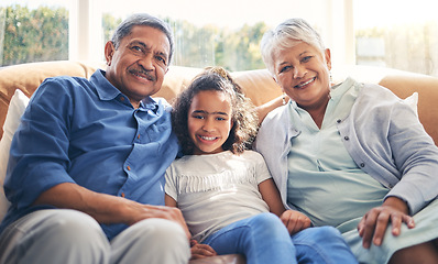 Image showing Grandparents, portrait and happy child on sofa in home living room, bonding and having fun together. Smile, grandma and grandfather with kid in lounge to relax with love, care and family connection