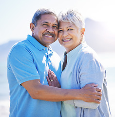 Image showing Love, portrait and senior couple at beach, hug or travel, bond and happy in nature together. Retirement, freedom and face of old people embrace at sea, trust or care on traveling ocean trip in Mexico