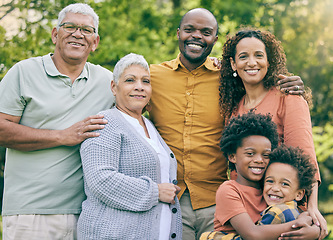 Image showing Portrait, happy and big family in nature, interracial and having fun together outdoor. Face, grandparents and children, mother and father smile for bonding in connection, love and care at park.