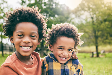 Image showing Portrait, boy and brothers hug outdoor in garden, park and nature for fun, good mood and happy. Face, smile and confident young african kids relaxing in summer, sun and play for freedom in Nigeria