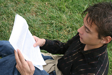 Image showing student reading outdoors