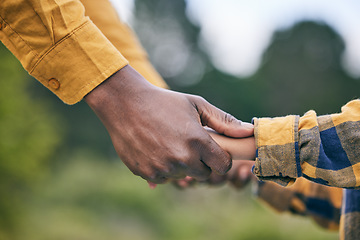 Image showing Park, holding hands and nature child, parent or family quality time, kindness and care on outdoor adventure, wellness or love. Support, relationship and kid freedom, connect or closeup people bonding
