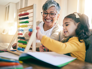 Image showing Education, family and child with grandmother, abacus or counting, project or homeschool, kindergarten or lesson. Learning, math and happy kid with grandma in living room help, teaching or development