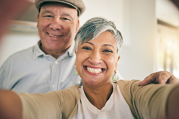 Image showing Senior couple, face and selfie in home for love, smile and relax to bond in retirement together. Portrait of happy woman, elderly man and profile picture for social media post, photography and memory