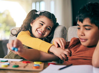 Image showing Children, education and girl tickle with her brother in the living room together for learning or homework. Family, kids and a boy with his sister in the home to study for school while playing