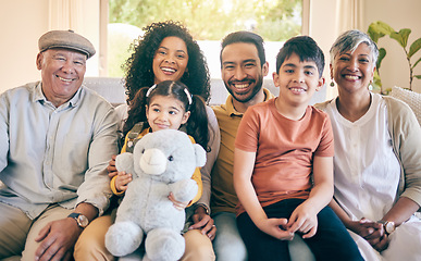 Image showing Portrait, smile and big family in home living room, bonding and having fun together. Happy, children and grandparents, mother and father in lounge on sofa with care, love and interracial connection