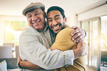 Image showing Hug, portrait and man with his senior father for bonding, love and care in the family home. Smile, happy and excited young male person embracing elderly dad in retirement at a modern house in Mexico.