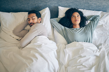 Image showing Interracial couple, fight and stress in bedroom for divorce, anger and thinking of breakup, cheating and anxiety from above. Man, woman and partner in bed for conflict, argument and drama of dispute