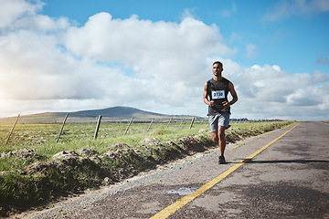 Image showing Exercise, marathon runner and man on road outdoor, cardio or healthy body. Athlete, training and fitness in race competition, workout energy or sport on street in wellness at countryside mockup space