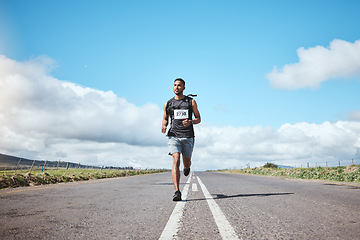 Image showing Sport, marathon runner and man on road outdoor, cardio or healthy body. Athlete, training and fitness exercise in competition, workout energy or race on street in wellness at countryside mockup space