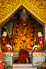 Image showing Buddhist monk praying in Shwedagon pagoda