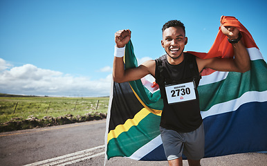 Image showing Portrait, sports and flag of South Africa with a man running on a street in nature for motivation or success. Fitness, winner or celebration with a runner cheering during cardio or endurance training