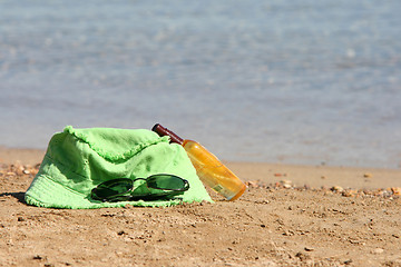 Image showing green hat and sunglasses