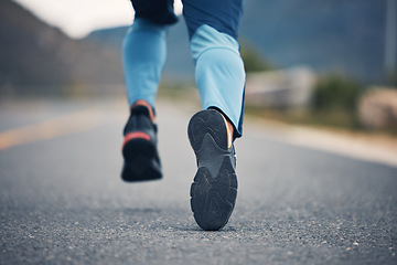 Image showing Street, legs and fitness person running for outdoor exercise, cardio workout or training for marathon race on asphalt road. Sports shoes, athlete foot steps or feet of closeup runner doing challenge