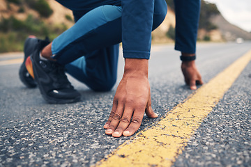 Image showing Hands, running and a man at the start of his road workout for cardio training in preparation of a marathon. Fitness, line and a male runner or athlete getting ready for a challenge on the street