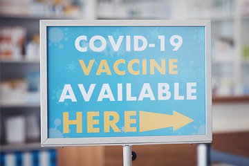 Image showing Covid 19 vaccine sign, arrow pointing or pharmacy service announcement for protection, health safety or medical healthcare. Hospital clinic, billboard or poster notification for corona virus security