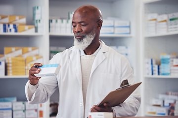 Image showing Pharmacy, medicine or mature black man reading product description, package information or clinic inventory of hospital stock. Box, medical pills or African pharmacist check pharmaceutical supplement