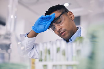 Image showing Tired, science and a man with burnout in a laboratory for research or innovation in medicine. Fatigue, fail and a young male scientist working to a deadline in a lab for medical breakthrough