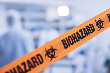 Image showing Lab safety, science and tape for a biohazard, hospital security or medical emergency. Caution, room and people in a building with an orange warning sign for danger, barrier or cleaning in a clinic