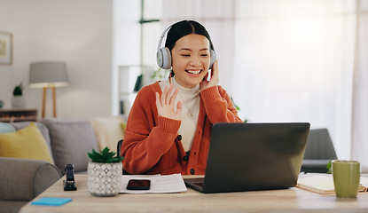 Image showing Woman on video call with work from home laptop, headphones and virtual international online meeting. Hello, wave and asian person in China in webinar for remote working or global update in computer
