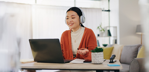 Image showing Woman on video call with work from home laptop, headphones and virtual international online meeting. Hello, wave and asian person in China in webinar for remote working or global update in computer