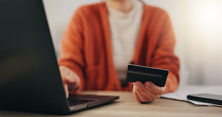 Image showing Laptop, credit card and online shopping with a woman customer searching for a retail product or making payment. Finance, accounting or ecommerce with a female consumer doing an internet search