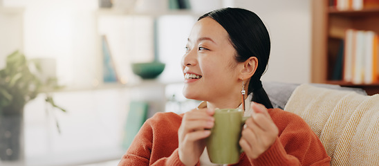 Image showing Thinking, coffee and Asian woman on couch, relax and decision with inspiration, decision and calm in living room. Japan, female and lady with tea, motivation and ideas in lounge, peace and gratitude